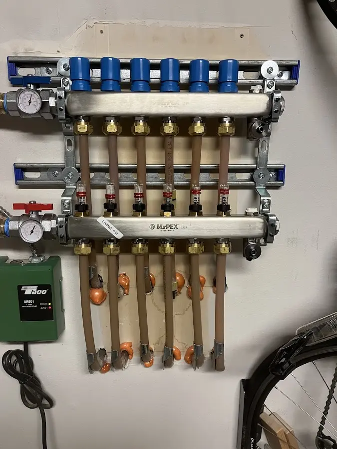 Plumber performing Gas Line Installation at a residential property in Central